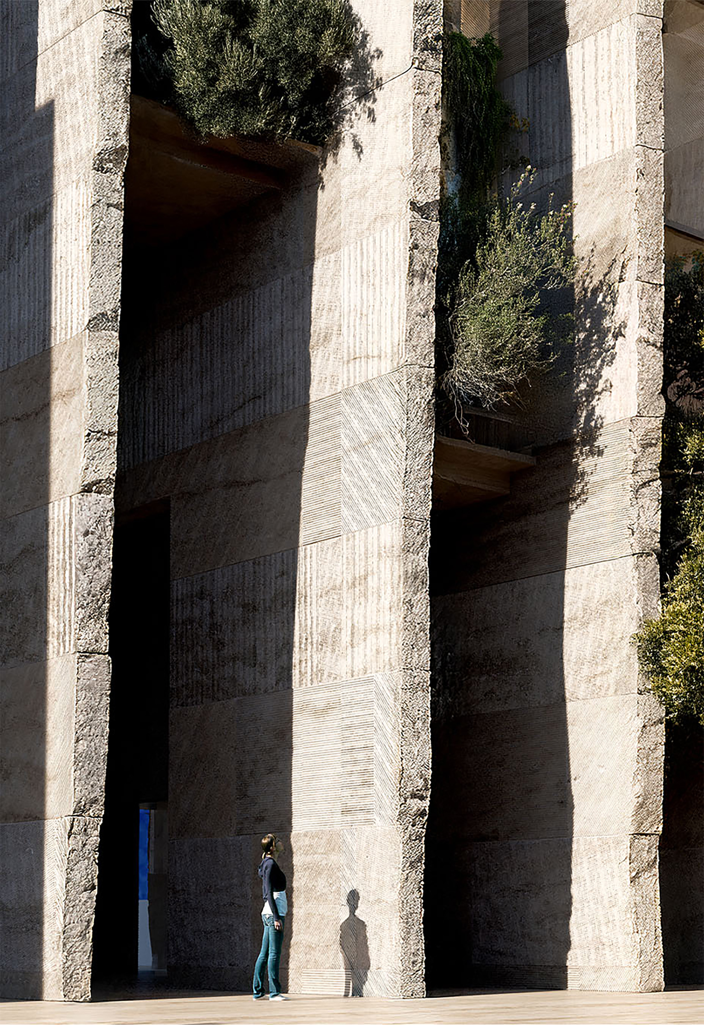 Guri Tower monumental stone columns at base